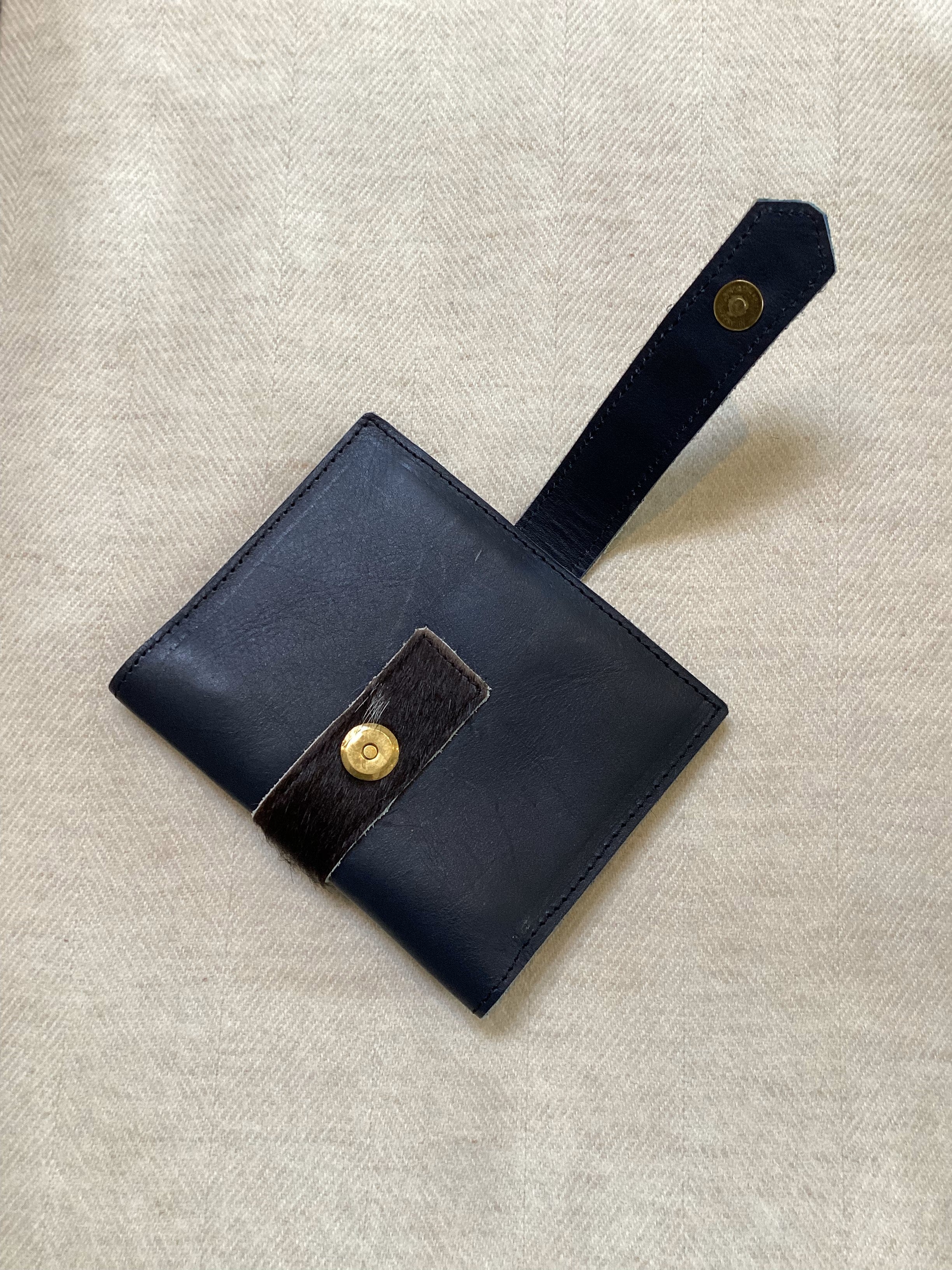 COWHIDE WALLET WITH SNAP CLOSURE