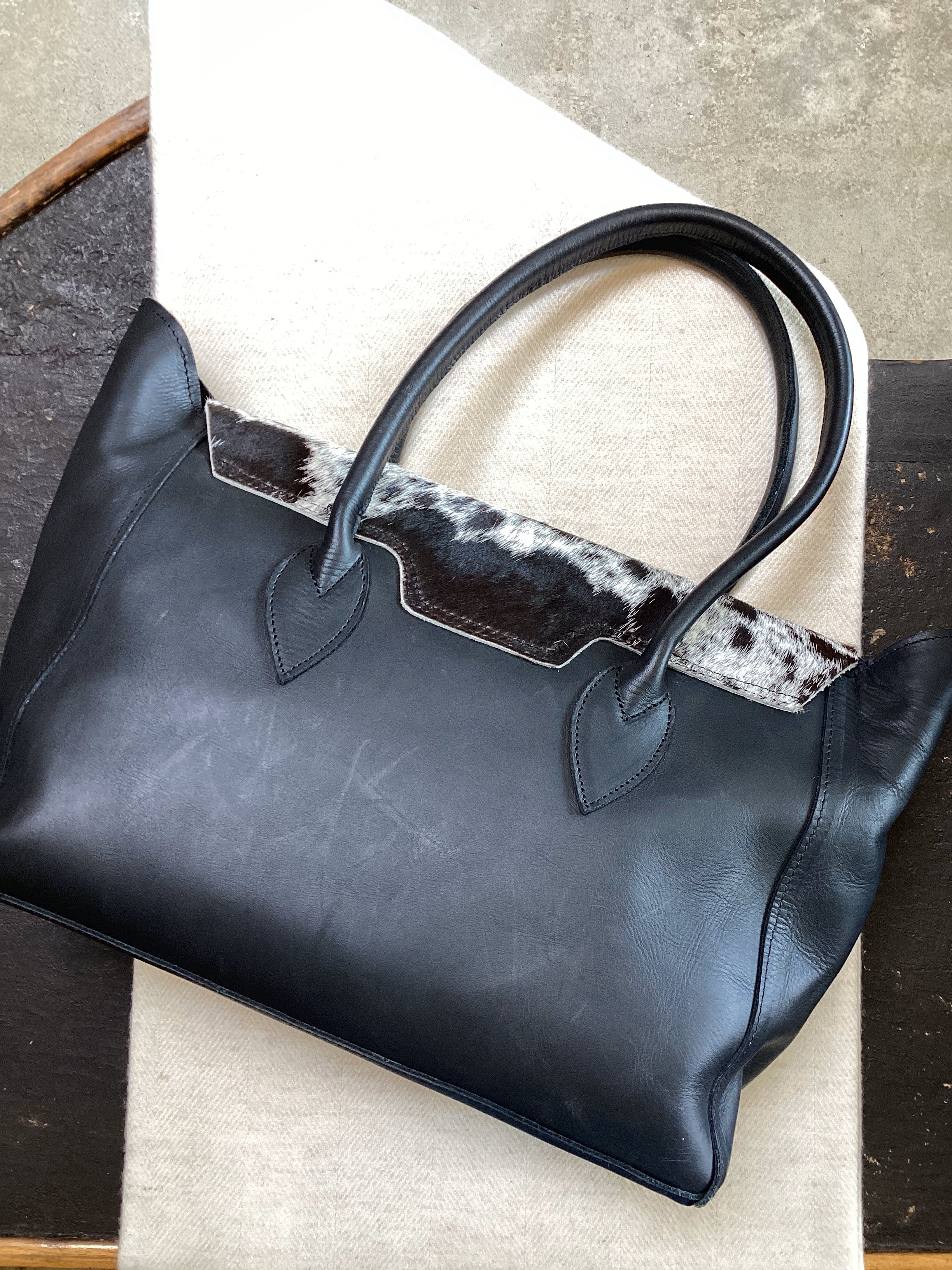 COWHIDE HANDBAG