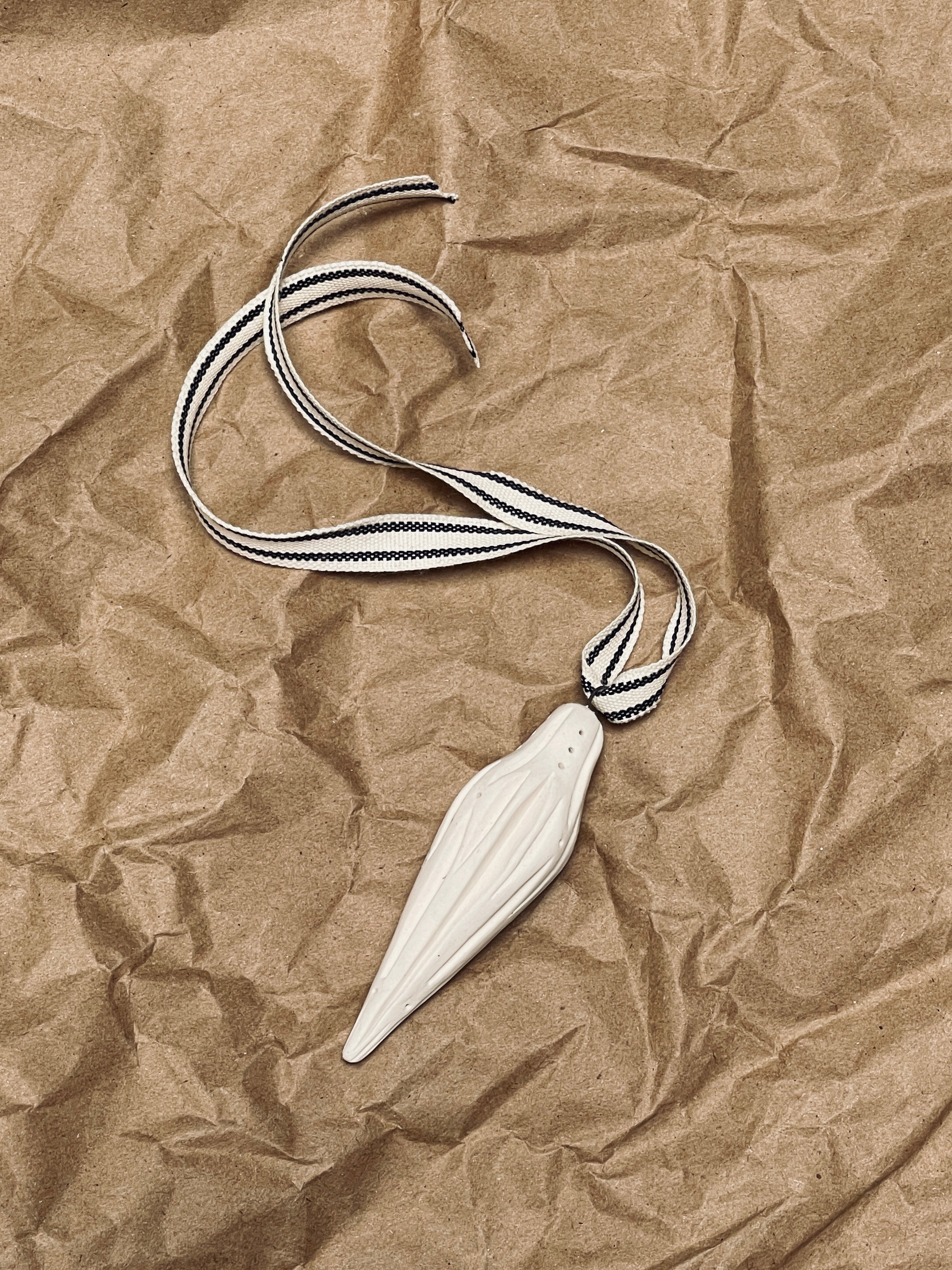 KATE PAK HAND CARVED ICICLE ORNAMENT