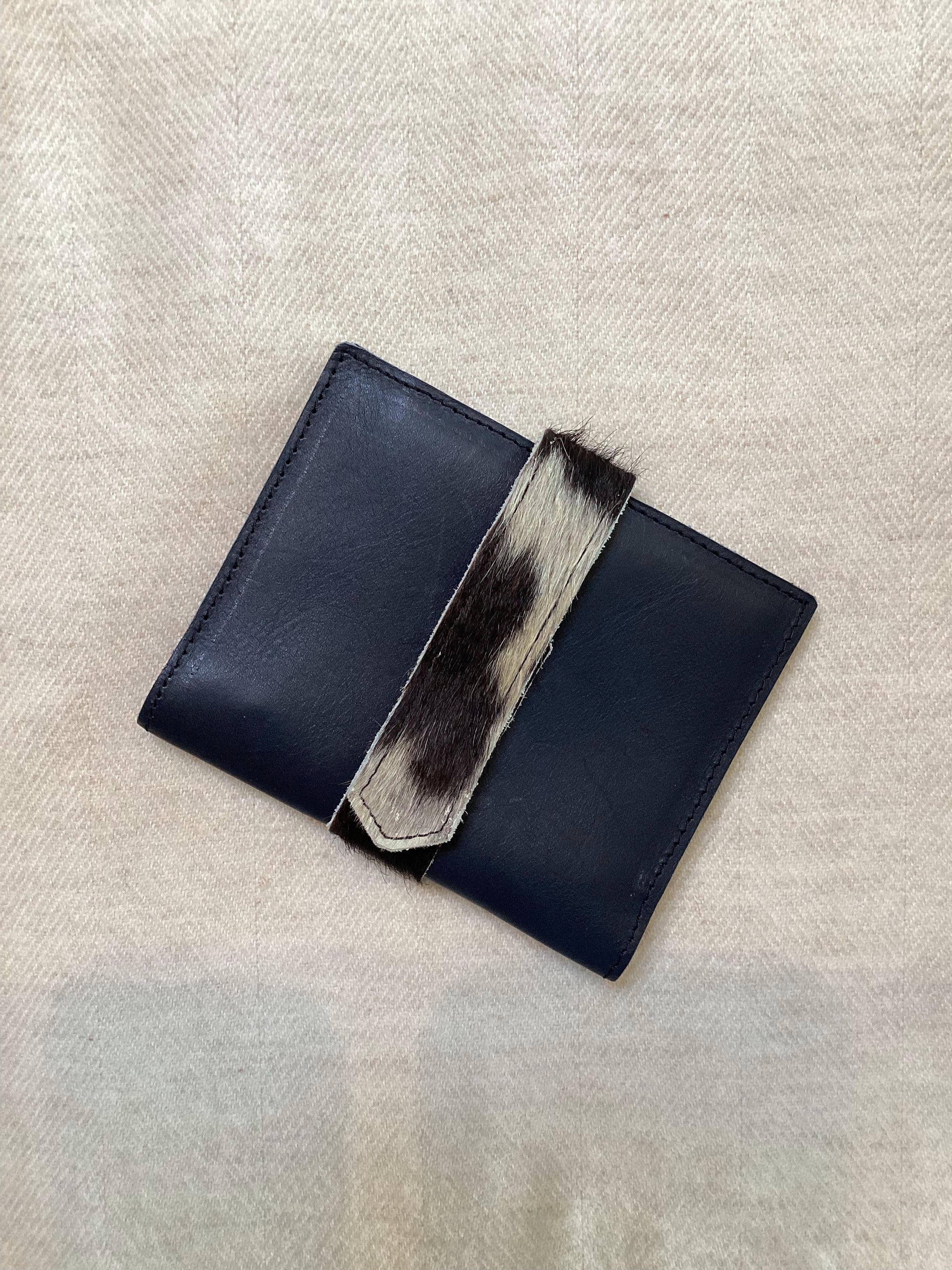 COWHIDE WALLET WITH SNAP CLOSURE