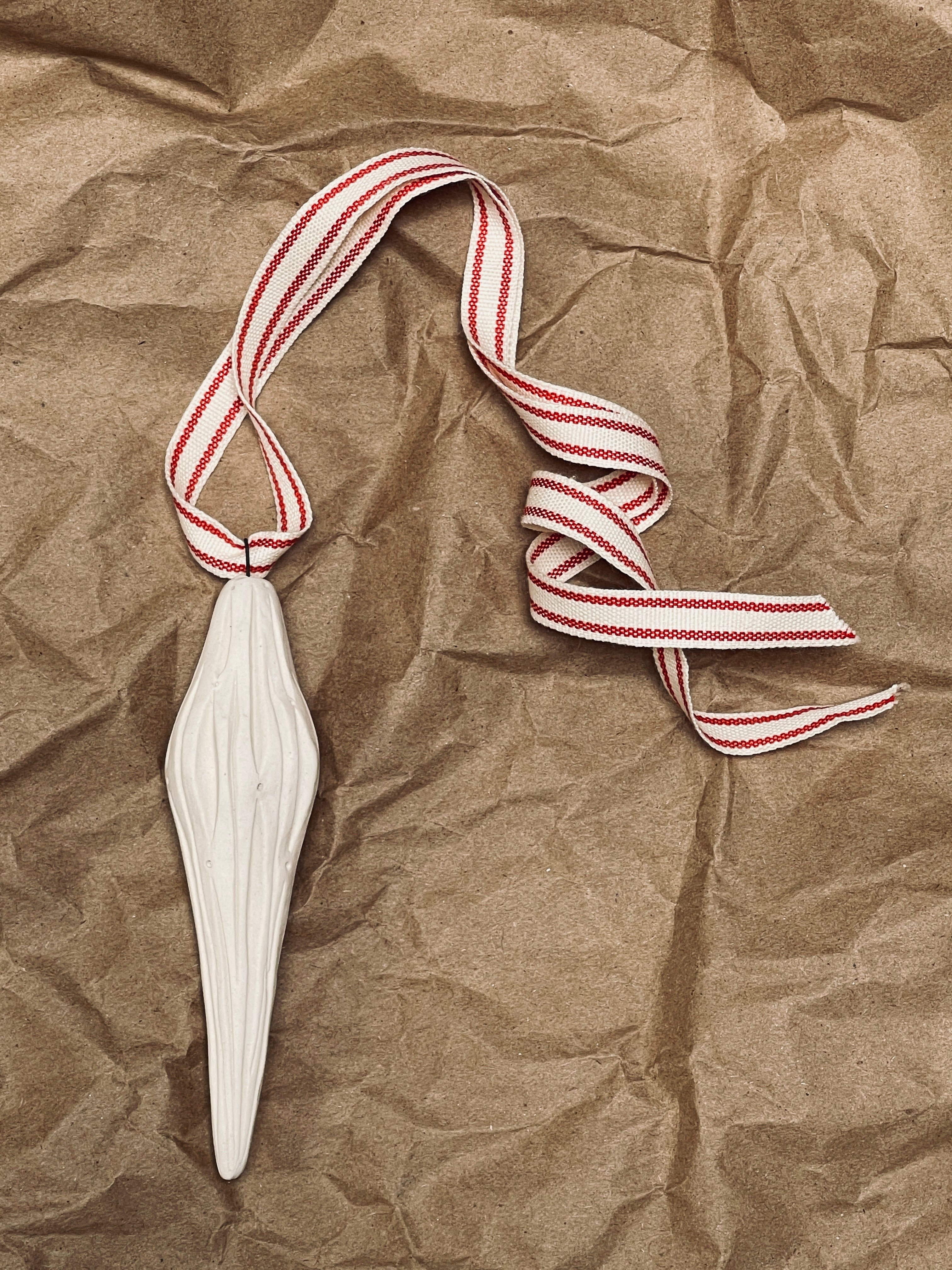 KATE PAK HAND CARVED ICICLE ORNAMENT