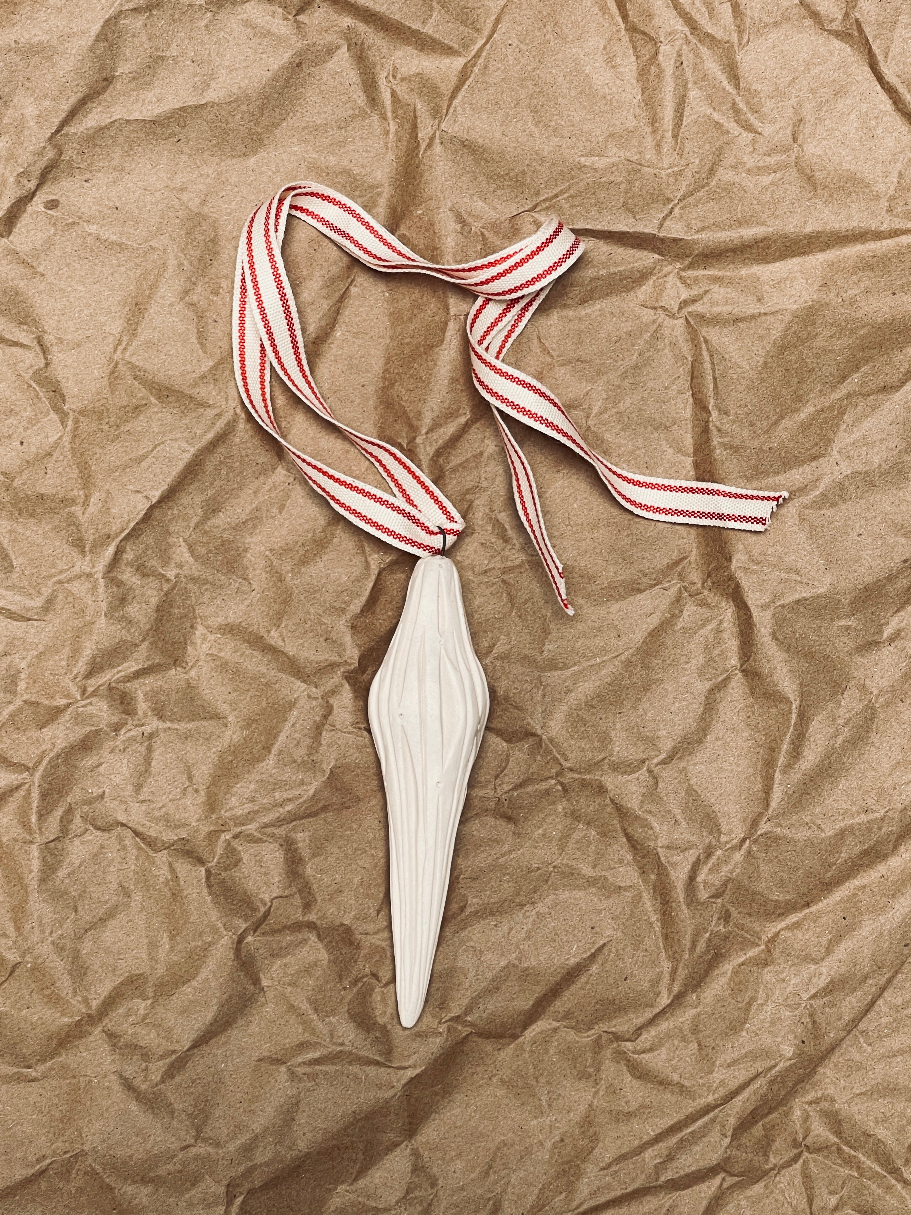 KATE PAK HAND CARVED ICICLE ORNAMENT